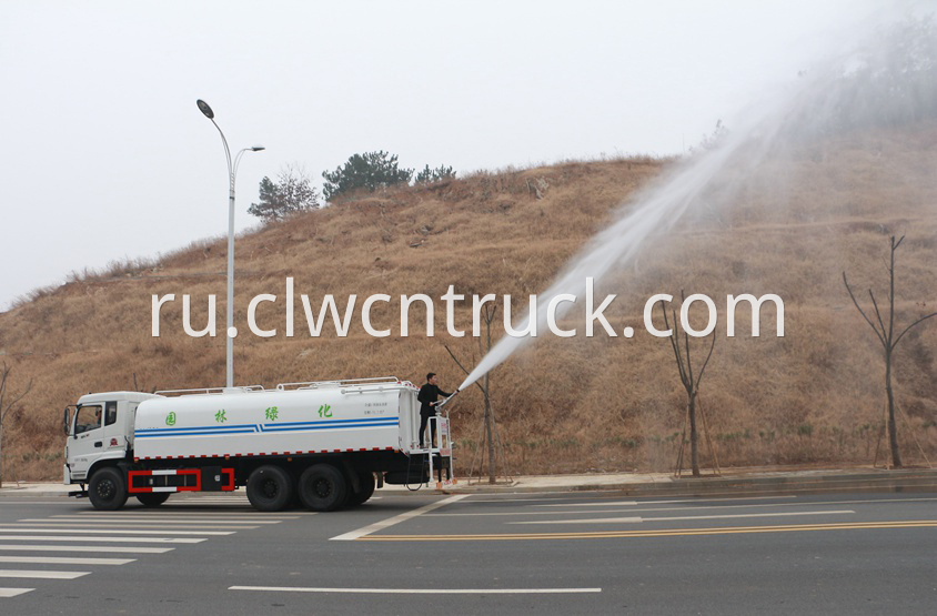 street water spray truck in action 4
